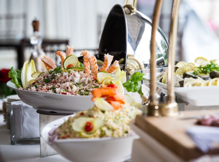 buffet-station Elegant food display featuring fresh salads and shrimp cocktail, showcasing Hudson Valley catering at West Hills Country Club.