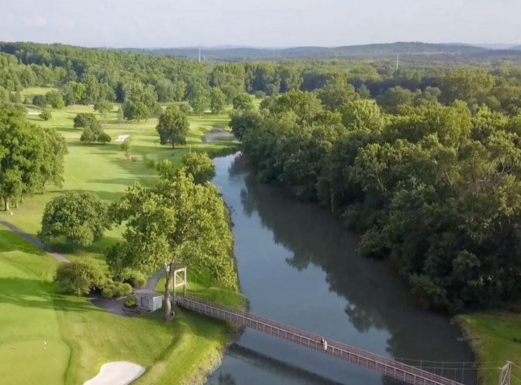 drone-update The West Hills Country Club Championship Private Middletown Golf Course with bridge and Walkill River in Orange County New York