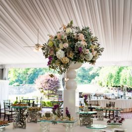 Floral arrangement on the grazing table during cocktail hour