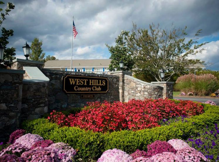 West Hills sign at the entrance before parking lot