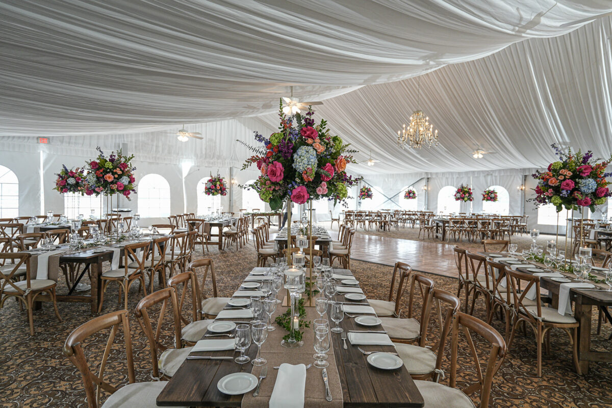 Farm Tables at The Grandview inside their tented ballroom