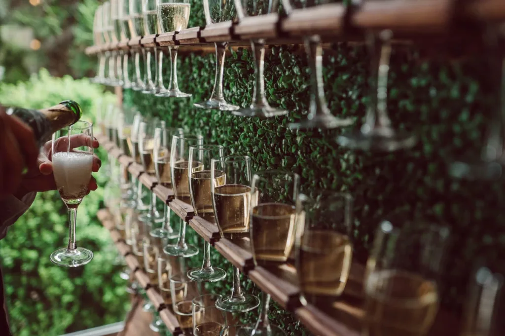 Champagne wall welcome at West Hills a Hudson Valley Wedding destination